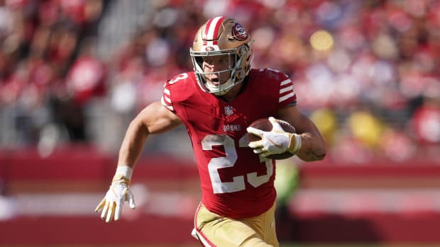 Christian McCaffrey scored four touchdowns in a win against the Cardinals.